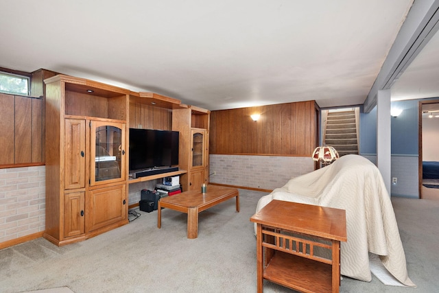 113 Oak Ave SW, Saint Michael, MN 55376 - living area with light colored carpet, stairway, and brick wall