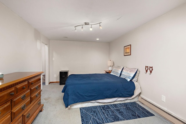 113 Oak Ave SW, Saint Michael, MN 55376 - bedroom with baseboard heating and light carpet