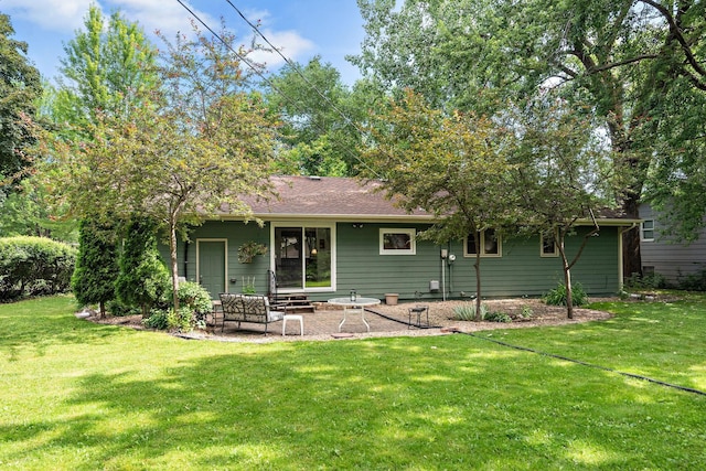 113 Oak Ave SW, Saint Michael, MN 55376 - back of house featuring a lawn, a patio, and roof with shingles