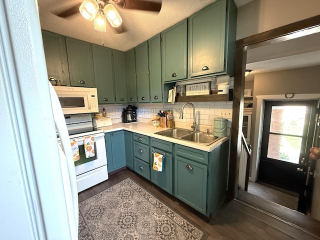 328 Jefferson Pl, Faribault, MN 55021 - kitchen with green cabinets, white appliances, a sink, ceiling fan, and light countertops