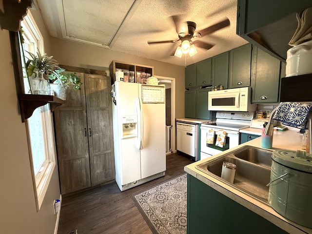 328 Jefferson Pl, Faribault, MN 55021 - kitchen featuring white appliances, green cabinetry, dark wood finished floors, a ceiling fan, and light countertops