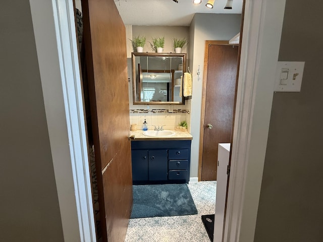 328 Jefferson Pl, Faribault, MN 55021 - bathroom with vanity and backsplash