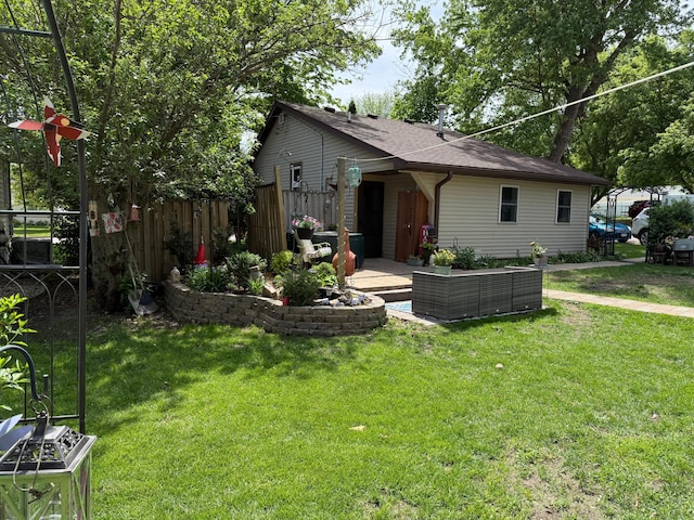 328 Jefferson Pl, Faribault, MN 55021 - view of front of home featuring a shingled roof and outdoor lounge area