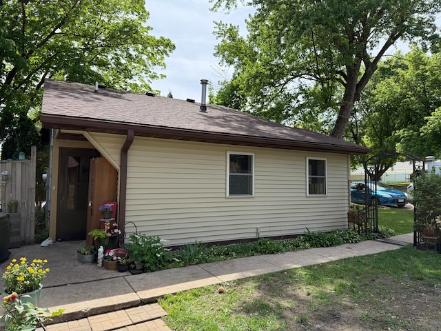 328 Jefferson Pl, Faribault, MN 55021 - view of property exterior with a shingled roof