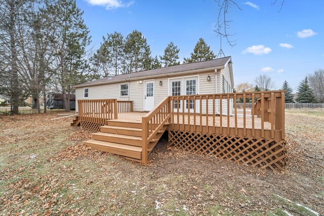 12005 Stacy Trl, Lindstrom, MN 55013 - rear view of property featuring a deck