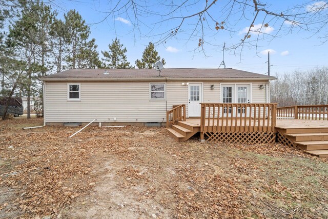 12005 Stacy Trl, Lindstrom, MN 55013 - rear view of property with crawl space and a wooden deck