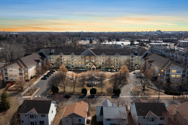 aerial view at dusk with a residential view