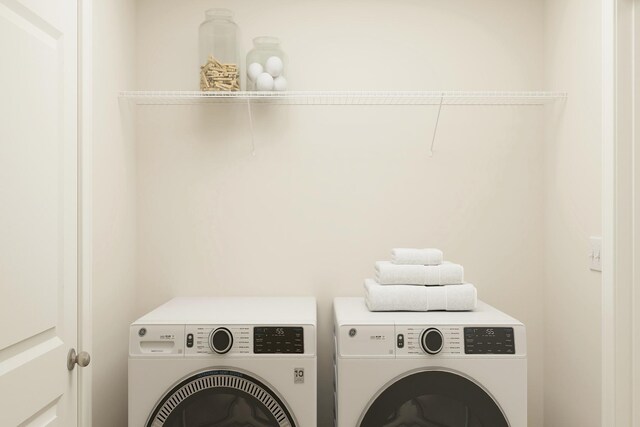408 Tanner Dr, Waverly, MN 55390 - laundry room with washer and dryer and laundry area