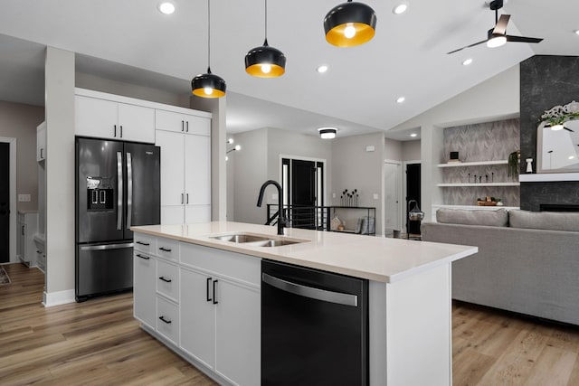 kitchen with dishwashing machine, black refrigerator with ice dispenser, a sink, lofted ceiling, and light wood finished floors