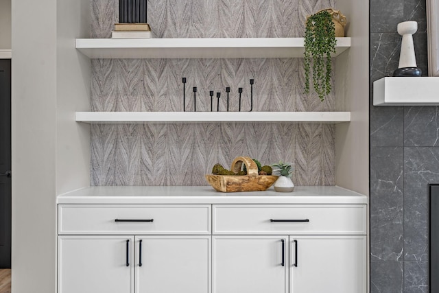 bar featuring decorative backsplash