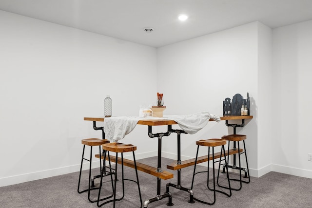 indoor dry bar with carpet floors, baseboards, and recessed lighting