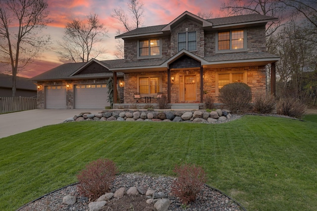 1301 Pondview Ln, Saint Joseph, MN 56374 - view of front facade with a front lawn, stone siding, a garage, covered porch, and driveway