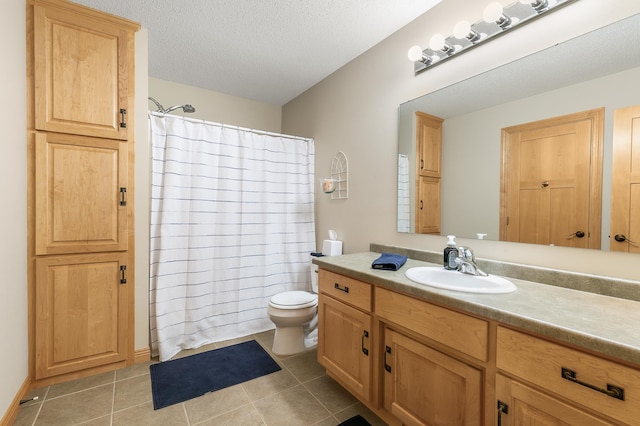 1301 Pondview Ln, Saint Joseph, MN 56374 - full bath with vanity, toilet, tile patterned floors, a textured ceiling, and a shower with curtain