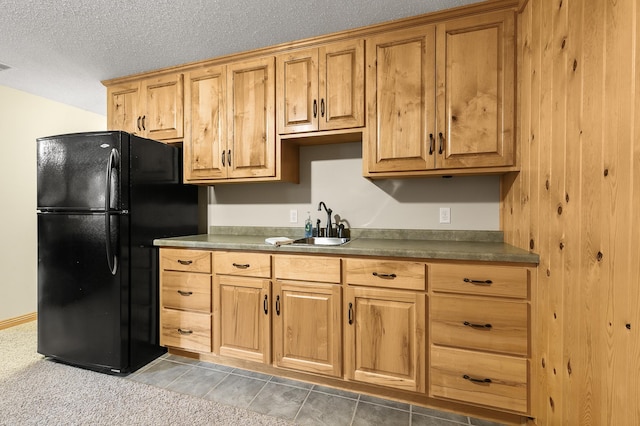1301 Pondview Ln, Saint Joseph, MN 56374 - kitchen with a sink, a textured ceiling, freestanding refrigerator, light tile patterned floors, and visible vents