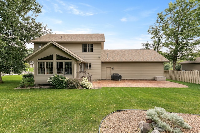 1301 Pondview Ln, Saint Joseph, MN 56374 - rear view of property featuring a patio, a lawn, and fence