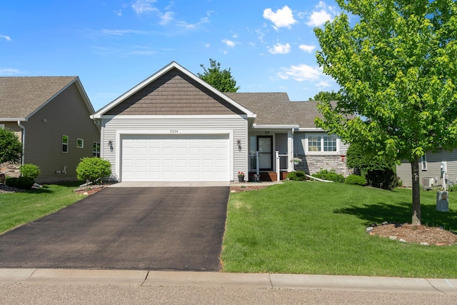 5234 Sundial Ln, Woodbury, MN 55129 - ranch-style house with driveway, an attached garage, and a front lawn