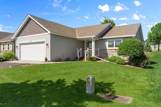 5234 Sundial Ln, Woodbury, MN 55129 - single story home with an attached garage, a front lawn, roof with shingles, concrete driveway, and stone siding