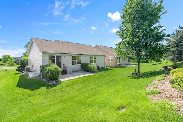 5234 Sundial Ln, Woodbury, MN 55129 - rear view of property with a patio area and a yard