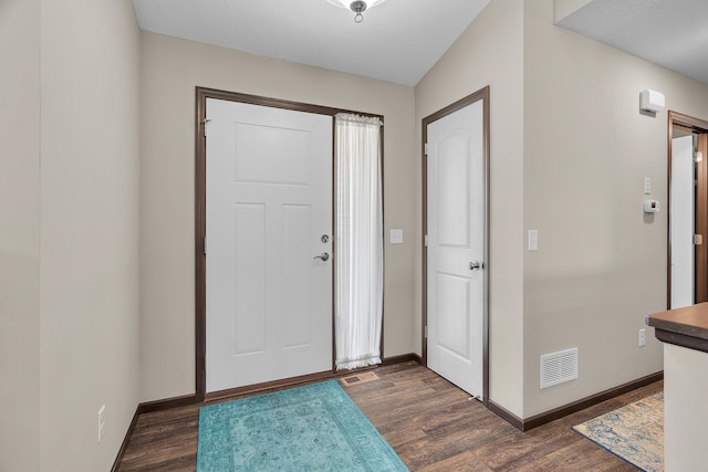 5234 Sundial Ln, Woodbury, MN 55129 - entrance foyer featuring dark wood-style floors and baseboards