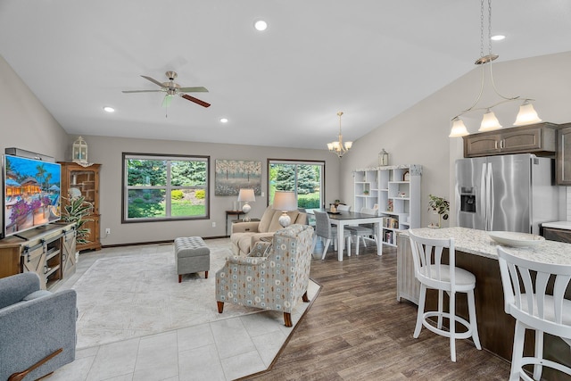 5234 Sundial Ln, Woodbury, MN 55129 - living room with lofted ceiling, a chandelier, ceiling fan, recessed lighting, and light wood finished floors