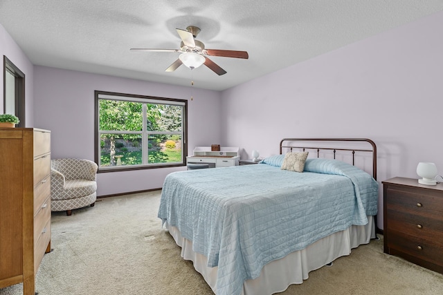 5234 Sundial Ln, Woodbury, MN 55129 - bedroom with light carpet, a textured ceiling, and ceiling fan