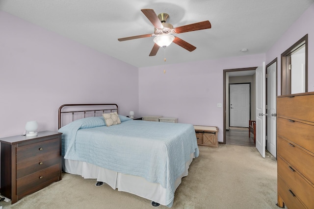 5234 Sundial Ln, Woodbury, MN 55129 - bedroom with light carpet and a ceiling fan