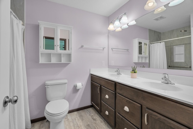 5234 Sundial Ln, Woodbury, MN 55129 - full bath featuring double vanity, wood finished floors, and curtained shower