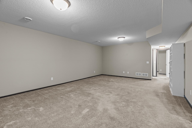 5234 Sundial Ln, Woodbury, MN 55129 - unfurnished room with light colored carpet and a textured ceiling