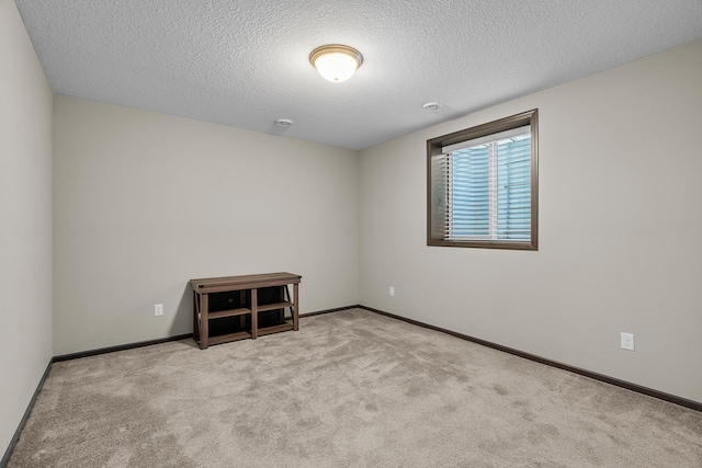 5234 Sundial Ln, Woodbury, MN 55129 - spare room featuring carpet flooring and a textured ceiling
