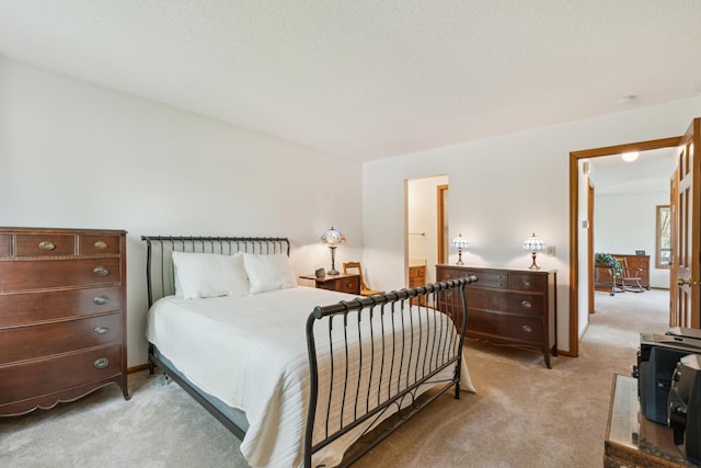 bedroom with light carpet