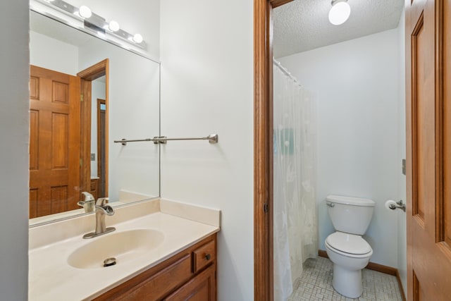 bathroom with toilet, vanity, tile patterned flooring, a textured ceiling, and a shower with shower curtain