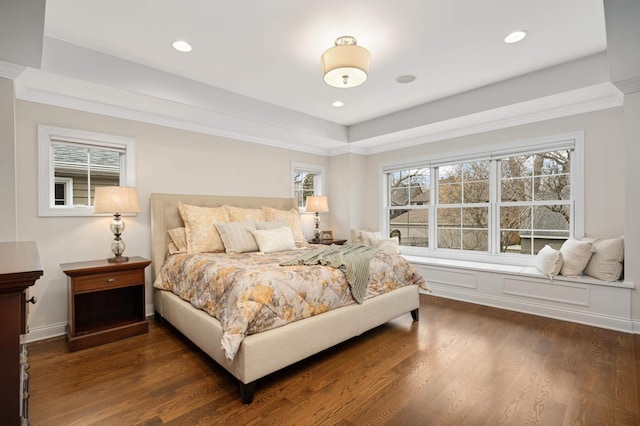 bedroom with recessed lighting, crown molding, multiple windows, and wood finished floors