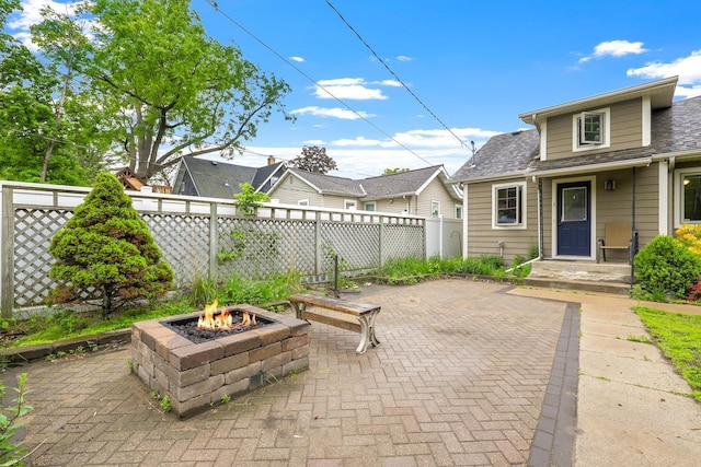 5441 44th Ave S, Minneapolis, MN 55417 - view of patio / terrace featuring a fire pit