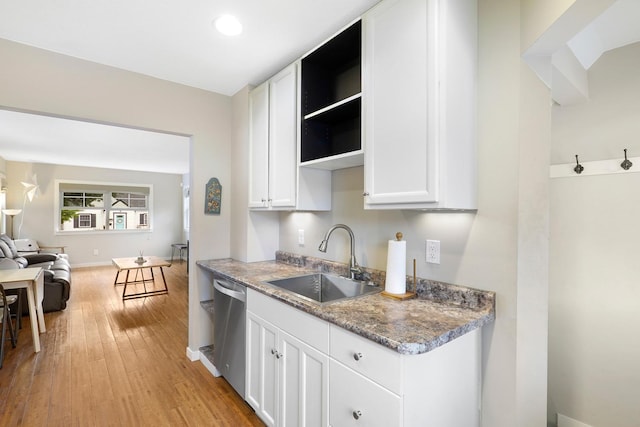 5441 44th Ave S, Minneapolis, MN 55417 - kitchen with dishwasher, light wood-style flooring, open shelves, white cabinetry, and open floor plan