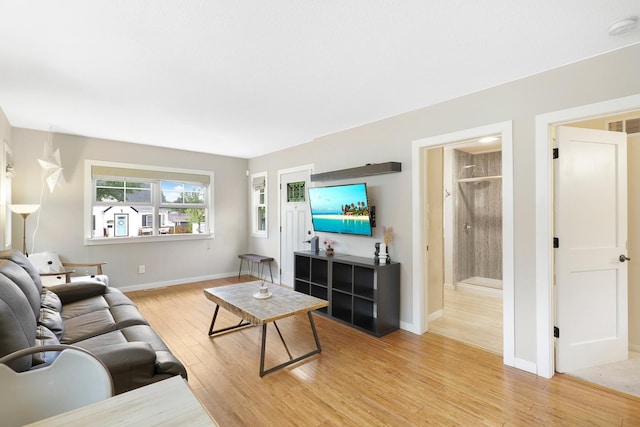 5441 44th Ave S, Minneapolis, MN 55417 - living area with light wood-style floors and baseboards