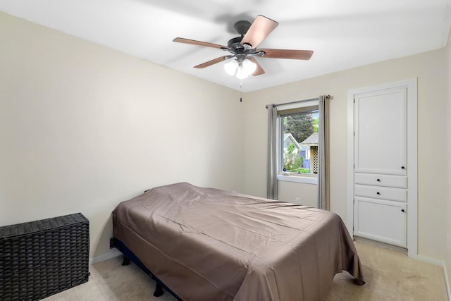 5441 44th Ave S, Minneapolis, MN 55417 - bedroom with light colored carpet, baseboards, and ceiling fan