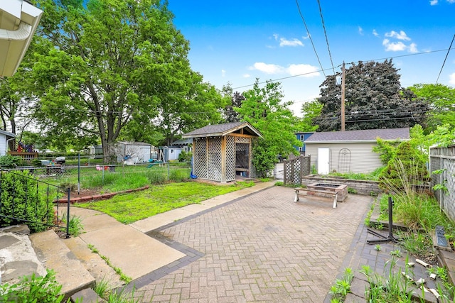 5441 44th Ave S, Minneapolis, MN 55417 - view of patio featuring an outdoor structure