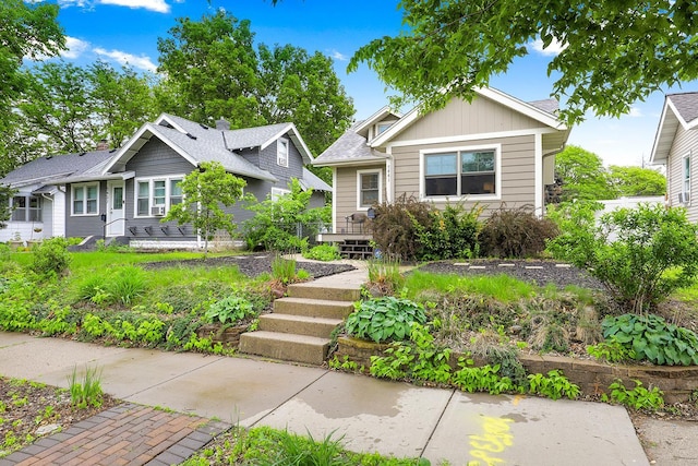 5441 44th Ave S, Minneapolis, MN 55417 - view of front facade featuring board and batten siding and a deck