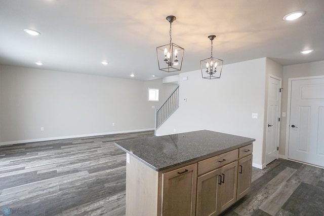 8072 Goldfinch Dr, Horace, ND 58047 - kitchen with dark wood-style flooring, baseboards, decorative light fixtures, a chandelier, and recessed lighting