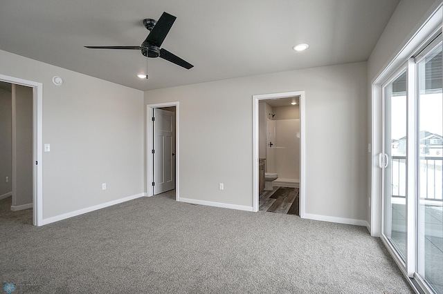 8072 Goldfinch Dr, Horace, ND 58047 - unfurnished bedroom featuring access to exterior, carpet flooring, baseboards, ensuite bath, and recessed lighting