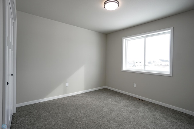 8072 Goldfinch Dr, Horace, ND 58047 - carpeted empty room featuring baseboards