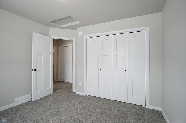 8072 Goldfinch Dr, Horace, ND 58047 - unfurnished bedroom with carpet floors, baseboards, and a closet