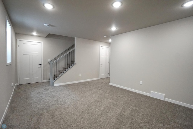 8072 Goldfinch Dr, Horace, ND 58047 - basement featuring stairs, carpet flooring, recessed lighting, and baseboards