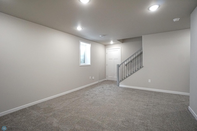 8072 Goldfinch Dr, Horace, ND 58047 - below grade area with baseboards, stairs, carpet, and recessed lighting