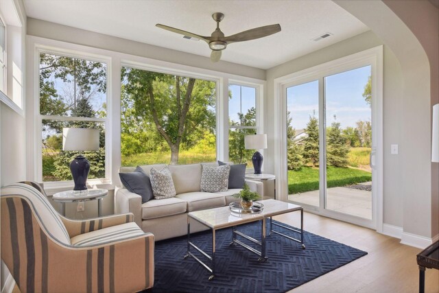 3725 Queensland Ln N, Plymouth, MN 55446 - sunroom / solarium with arched walkways and visible vents
