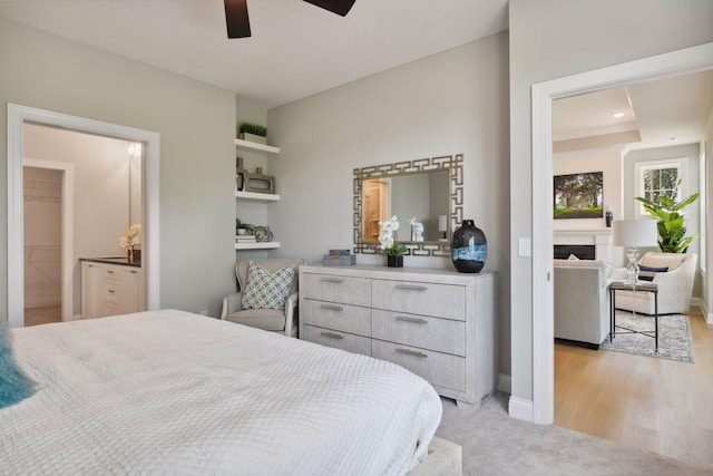 3725 Queensland Ln N, Plymouth, MN 55446 - bedroom with light colored carpet, a ceiling fan, ensuite bathroom, baseboards, and recessed lighting