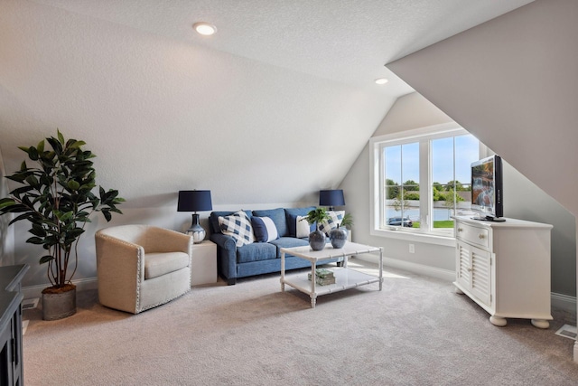3725 Queensland Ln N, Plymouth, MN 55446 - living room with vaulted ceiling, carpet flooring, a textured ceiling, baseboards, and recessed lighting