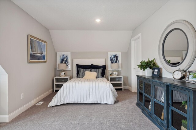 3725 Queensland Ln N, Plymouth, MN 55446 - bedroom featuring baseboards, vaulted ceiling, visible vents, and carpet