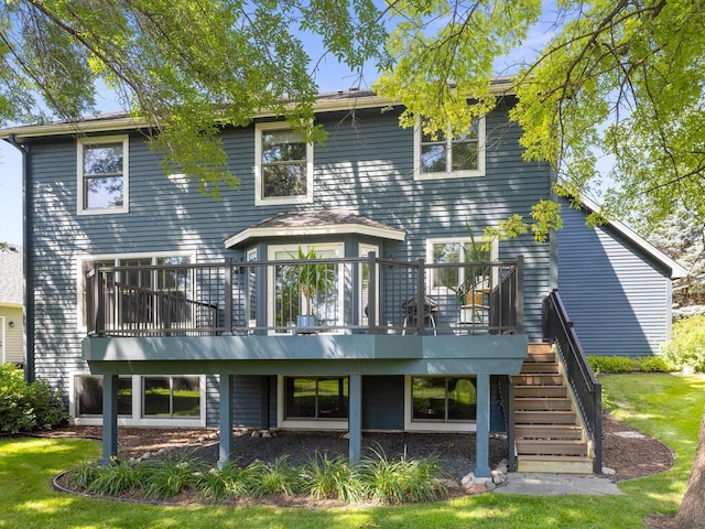 8118 Currant Pl, Eden Prairie, MN 55347 - back of house with stairs, a wooden deck, and a yard