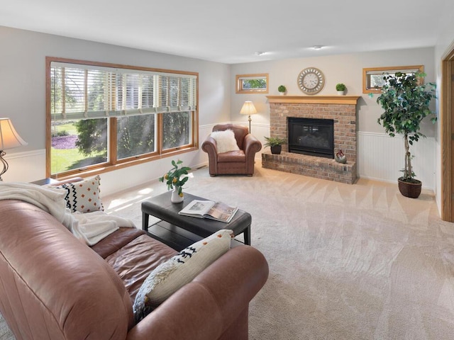 8118 Currant Pl, Eden Prairie, MN 55347 - carpeted living room with a wainscoted wall and a brick fireplace
